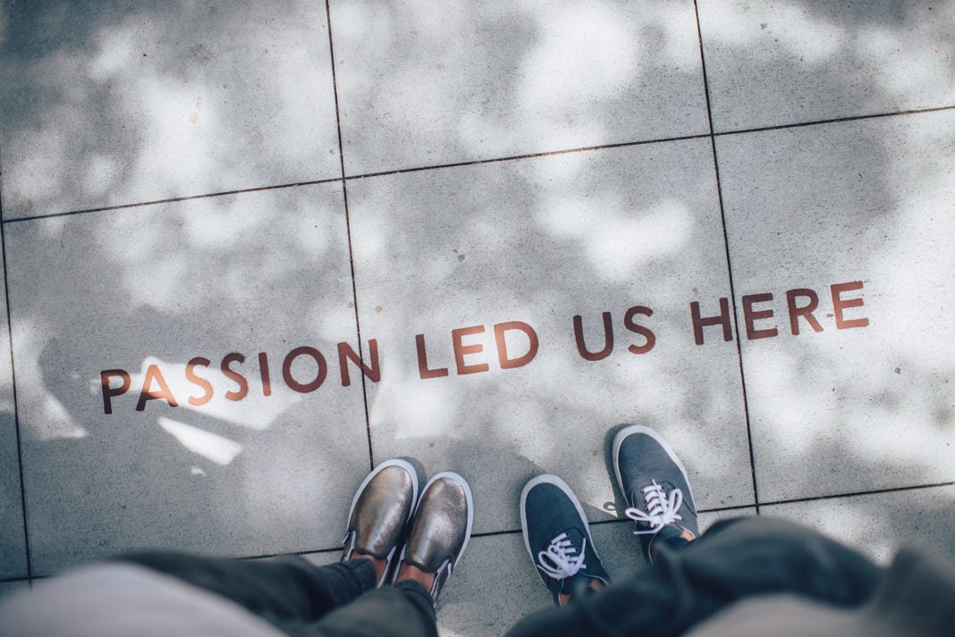 Feet on sidewalk, with words 