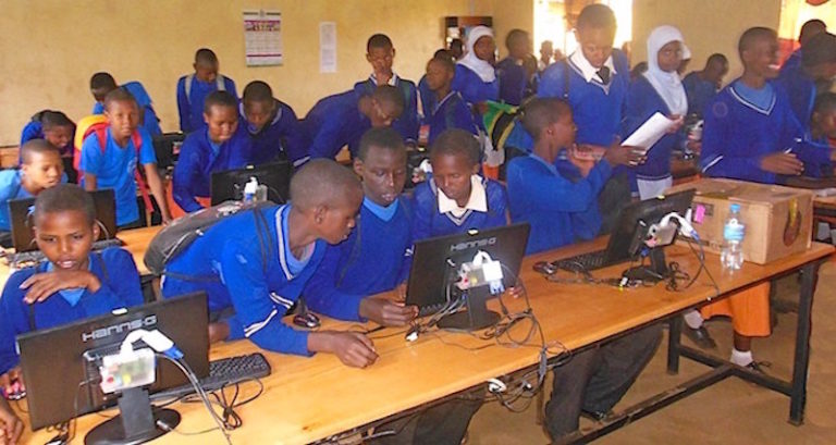 Using Open Source to Empower Students in Tanzania